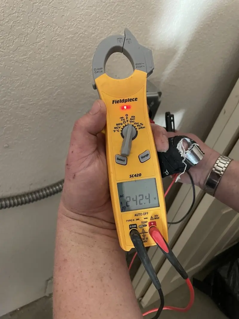 Voltage testing with clamp meter during Generator Installation in Ely